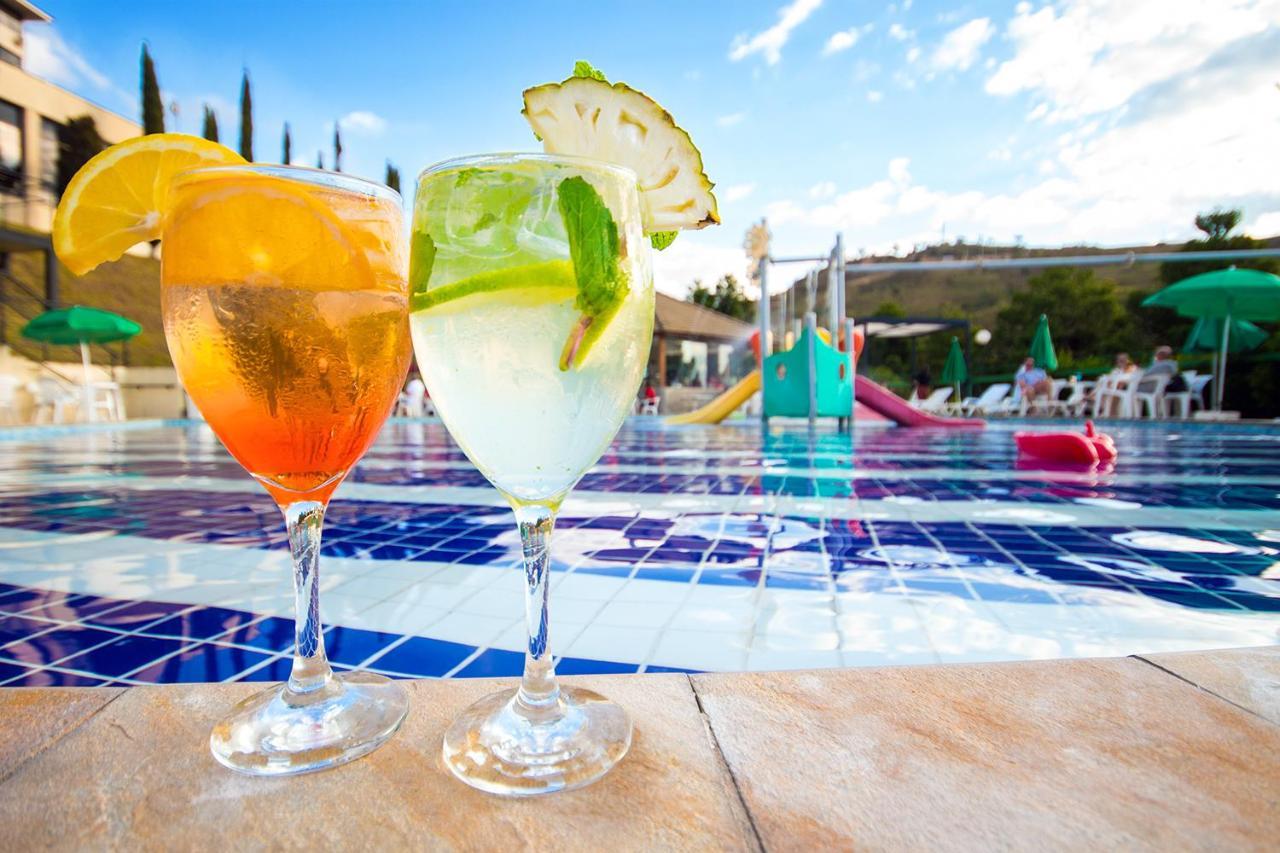 Golden Park All Inclusive Poços de Caldas Dış mekan fotoğraf Two Aperol Spritz cocktails